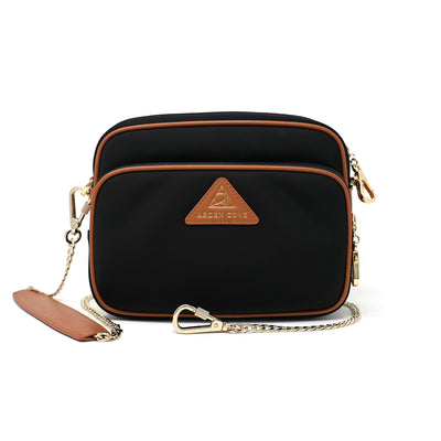 Anti-theft Water-resistant Travel Crossbody - Crissy Full Crossbody in Black/Brown Gold with slash-resistant locking clasps chain straps - front view - Arden Cove