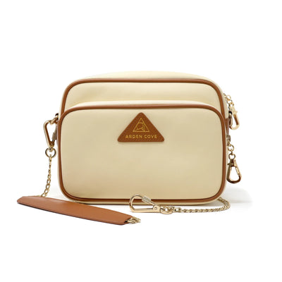 Anti-theft Water-resistant Travel Crossbody - Crissy Full Crossbody in Cream Gold with slash-resistant locking clasps chain straps - front view - Arden Cove