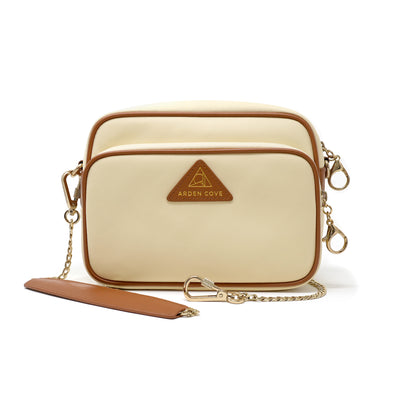 Anti-theft Water-resistant Travel Crossbody - Crissy Full Crossbody in Cream Gold with slash-resistant locking clasps chain straps - front view - Arden Cove