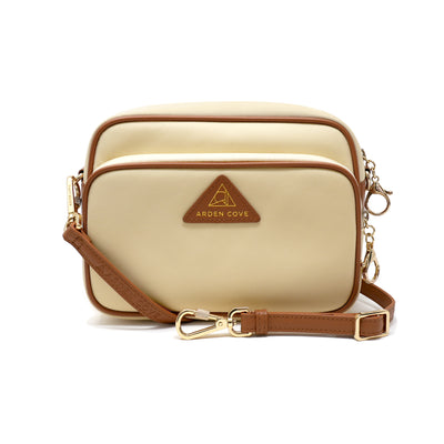 Anti-theft Water-resistant Travel Crossbody - Crissy Full Crossbody in Cream Gold with slash-resistant locking clasps straps - front view - Arden Cove