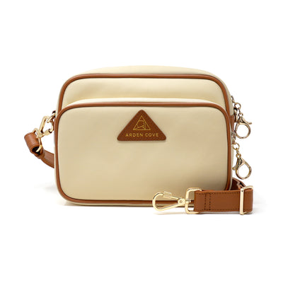 Anti-theft Water-resistant Travel Crossbody - Crissy Full Crossbody in Cream Gold with slash-resistant wide faux leather strap & locking clasps straps - front view - Arden Cove