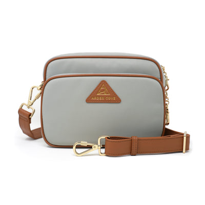 Anti-theft Water-resistant Travel Crossbody - Crissy Full Crossbody in Light Grey Gold with wide slash-resistant faux leather locking clasps straps - front view - Arden Cove