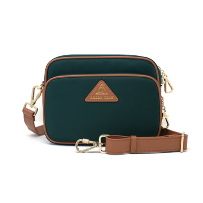 Anti-theft Water-resistant Travel Crossbody - Crissy Full Crossbody in Forrest Green Gold with slash-resistant wide faux leather locking clasps straps - front view - Arden Cove