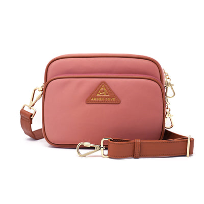 Anti-theft Water-resistant Travel Crossbody - Crissy Full Crossbody in Dusty Pink Gold with slash-resistant wide faux leather locking clasps straps - front view - Arden Cove