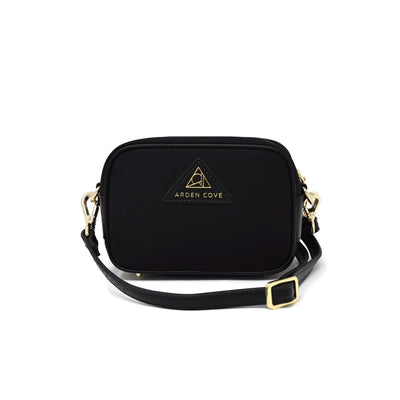 Anti-theft Water-resistant Travel Crossbody - Crissy Mini Crossbody in Black Gold with slash-resistant faux Leather & classic clasps straps - front view - Arden Cove