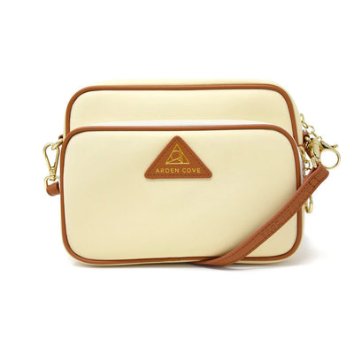 Anti-theft Water-resistant Travel Crossbody - Crissy Full Crossbody in Cream Gold with slash-resistant faux leather & classic clasps straps - front view - Arden Cove