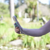 phone tether attaches your photo to your bag or pants to deter theft