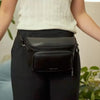 Anti-theft slash resistant jacquard strap in short length is adjustable. Perfect for waist bag style