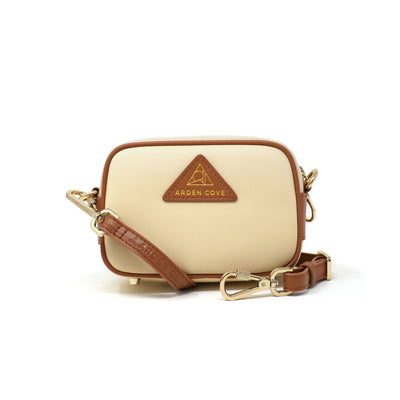 Anti-theft Water-resistant Travel Crossbody - Crissy Mini Crossbody in Cream Gold with slash-resistant faux leather & locking clasps straps - front view - Arden Cove