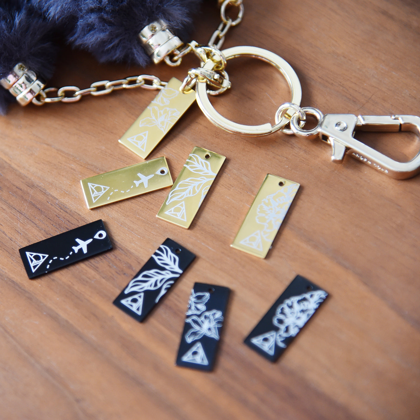 Keychain with Fuzzy Bracelet Close up of fur color and charm design alongside bracelet
